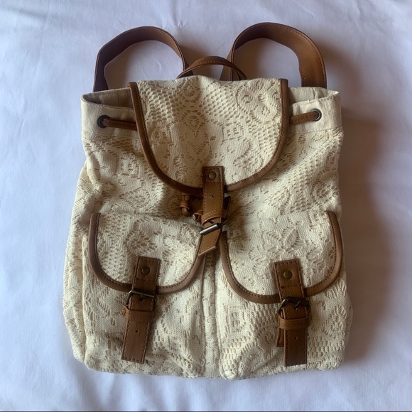 Wet Seal Handbags - Crochet leatherette backpack